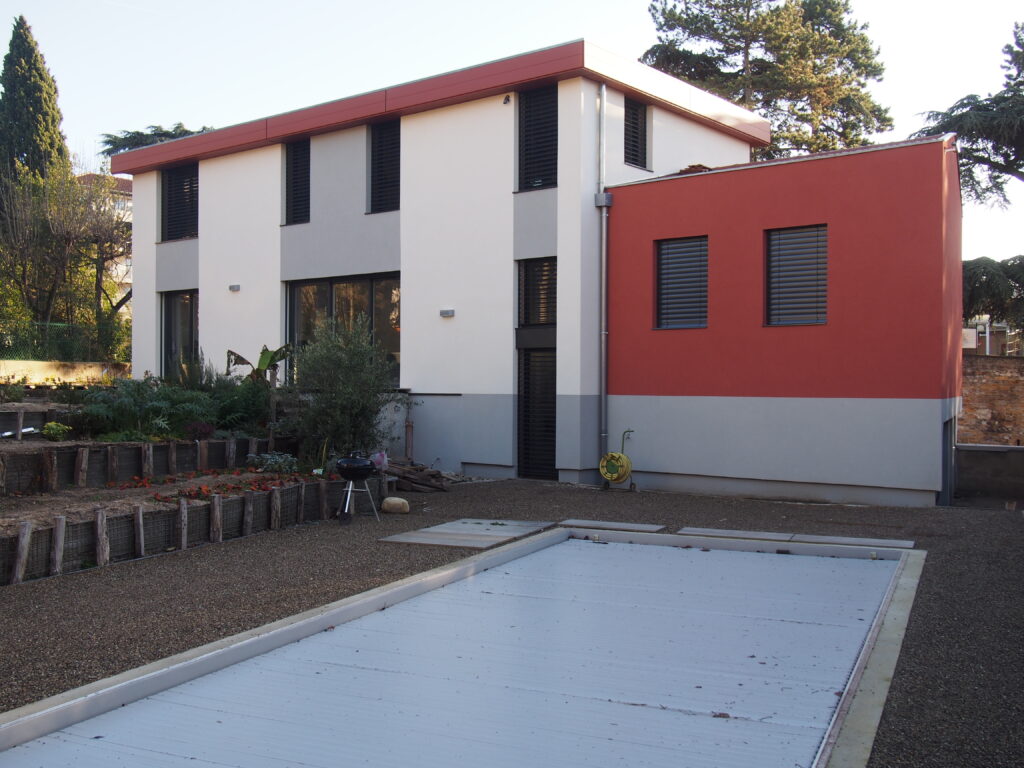 Construction ossature bois avec isolation en ouate de cellulose et fibre de bois